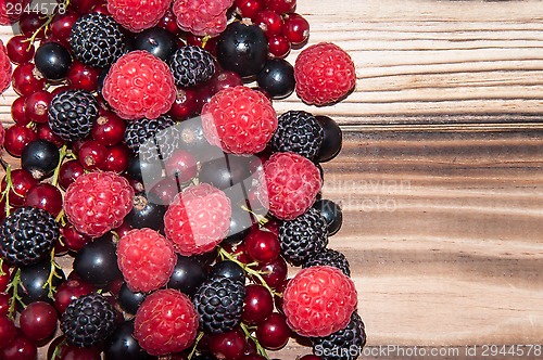 Image of Assorted Berry on the wooden table