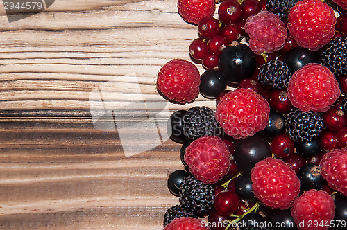 Image of Assorted Berry on the wooden table