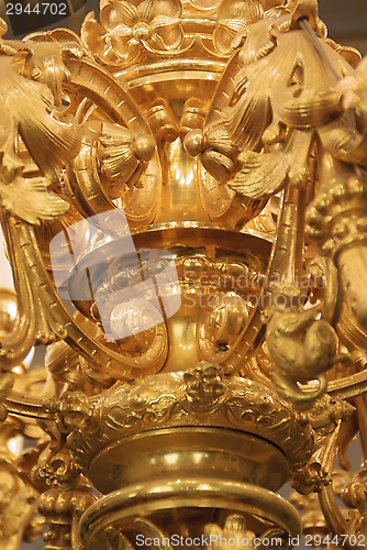 Image of golden chandeliers