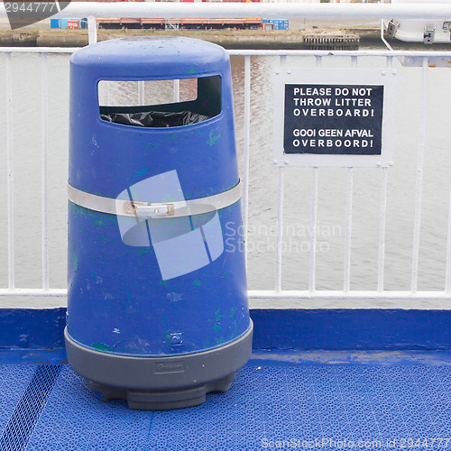 Image of Blue bin on deck of cruise liner