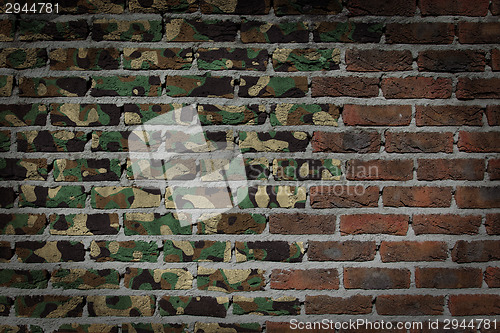 Image of Dark brick wall - Army camouflage