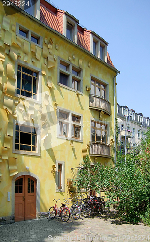 Image of yellow house facade