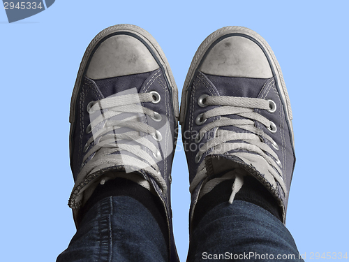 Image of feet and blue sky