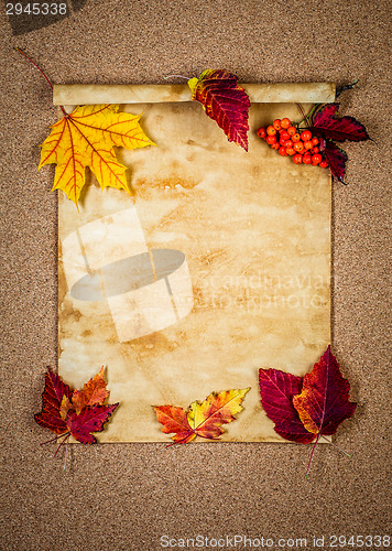 Image of Old paper with autumn leaves