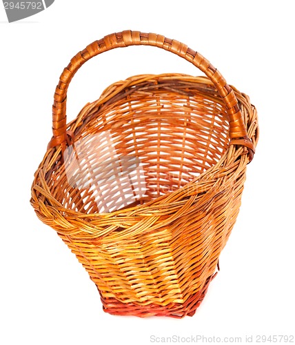 Image of Empty wicker basket. Isolated on white background.