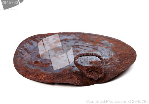 Image of Old rusty cap of tin can isolated on white backgroun