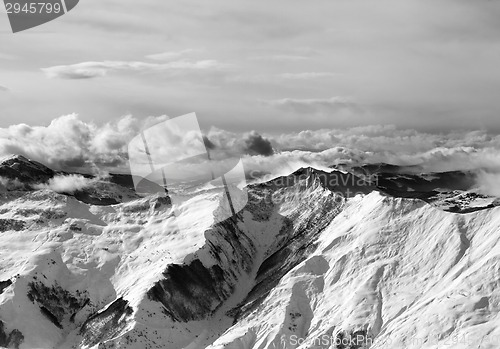 Image of Black and white winter mountains in mist