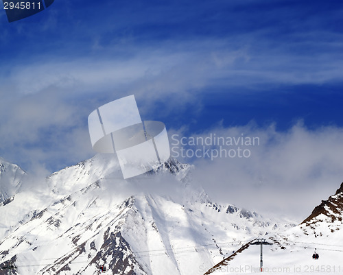 Image of Winter mountains and sky in mist