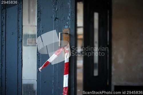 Image of Blue grungy door at a factory
