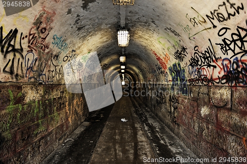 Image of Dark undergorund passage with light