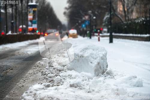 Image of Cars covered in snow after blizzard