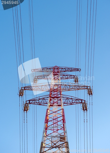 Image of Large transmission towers at sunset