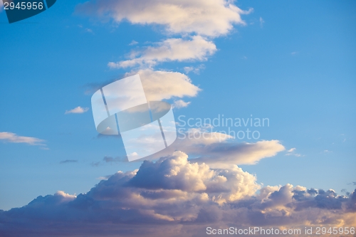 Image of Blue sky with fluffy clouds