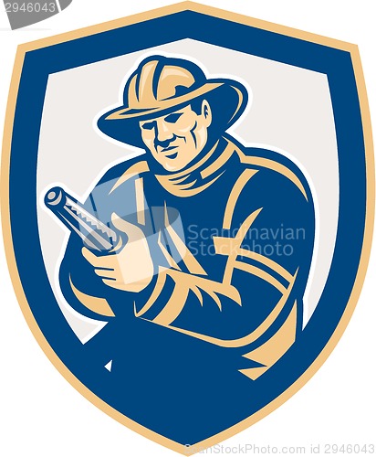 Image of Fireman Firefighter Aiming Fire Hose Shield Retro