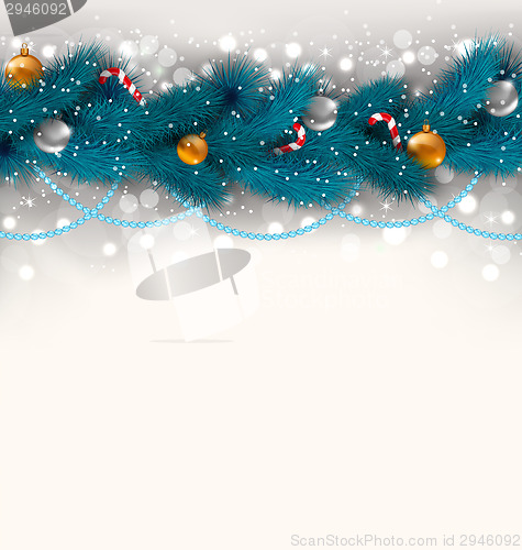 Image of Christmas decoration with fir branches, glass balls and sweet ca