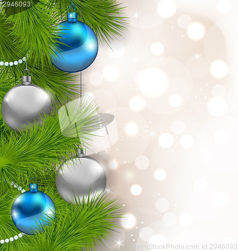 Image of Christmas glowing background with fir branches and glass balls