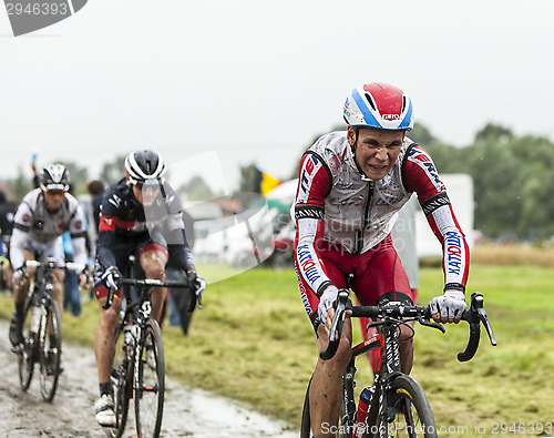 Image of The Cyclist Joaquim Rodriguez on a Cobbled Road - Tour de France