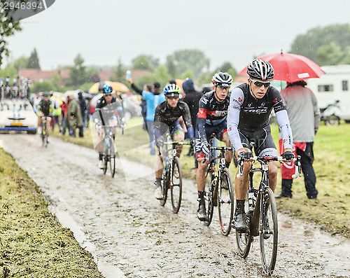 Image of The Cyclist Danny van Poppel on a Cobbled Road - Tour de France 