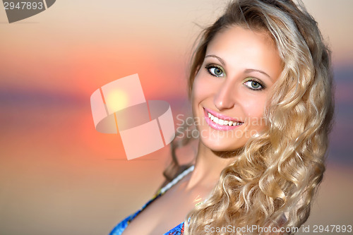 Image of Portrait of cheerful blond woman