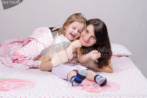 Image of Happy mother and three year old daughter