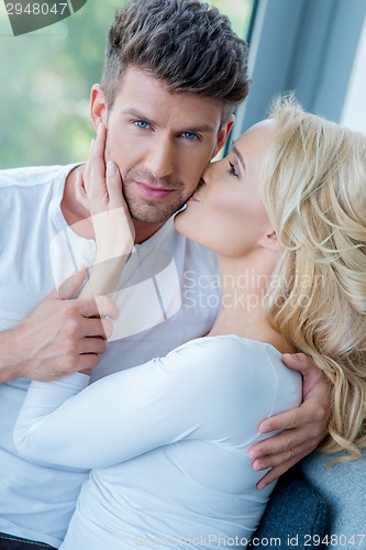 Image of Close up Sweet Caucasian Couple in White