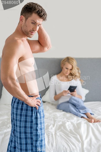 Image of Middle Age Couple Fashion at Bedroom