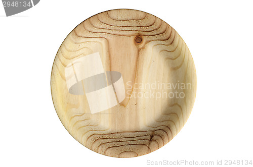 Image of round handmade wooden stained plate over white