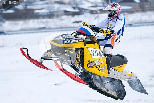 Image of Sport snowmobile jump on track