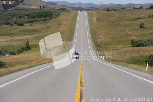 Image of Single van on straight road