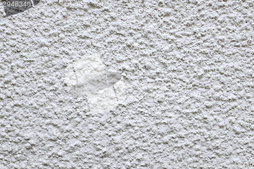 Image of Rough cement render painted white