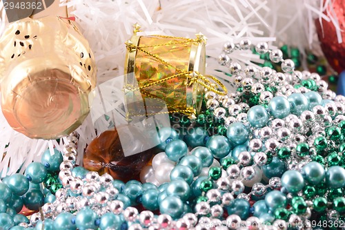 Image of Christmas background with wine bottle and pearls