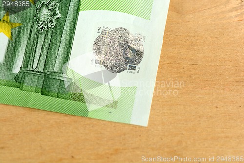 Image of Close up macro detail of euro money banknotes