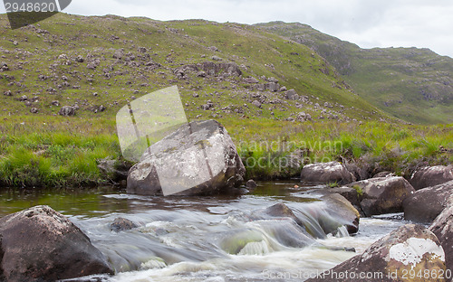 Image of Landscape with waterfall in the mountains