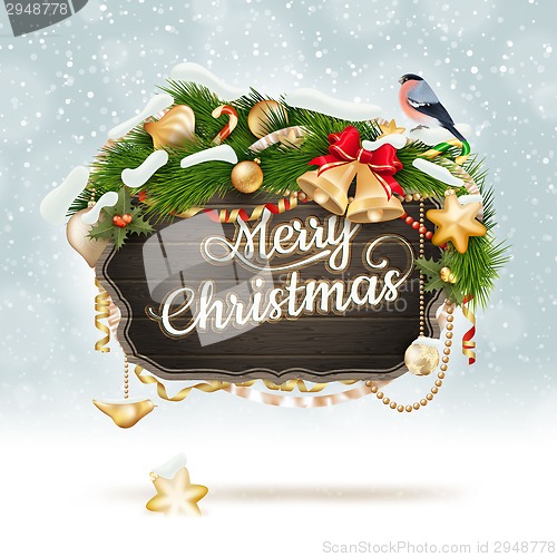 Image of Wooden banner with Christmas Fur-tree branches.