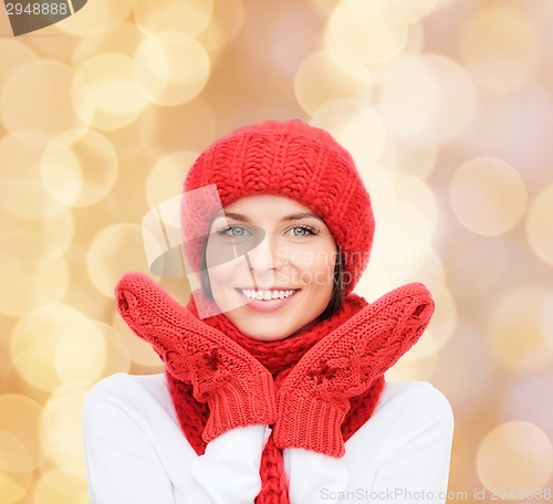 Image of smiling young woman in winter clothes