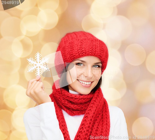 Image of smiling young woman in winter clothes