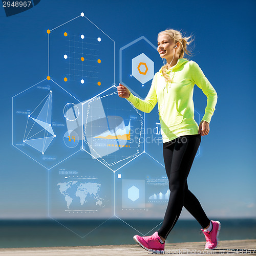 Image of smiling young woman exercising outdoors