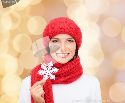 Image of smiling young woman in winter clothes