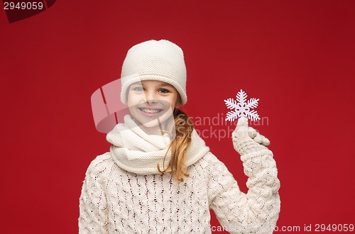 Image of girl with big snowflake