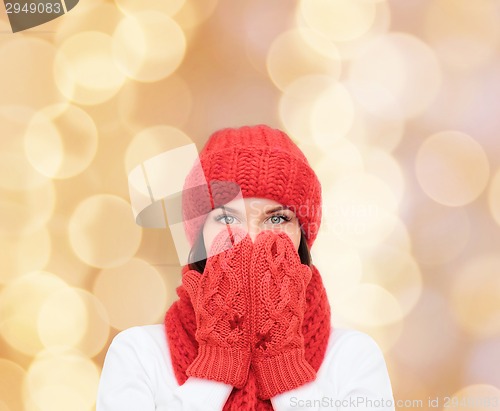 Image of smiling young woman in winter clothes