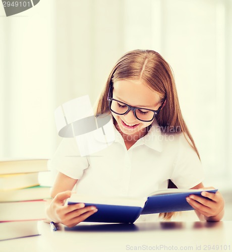 Image of student girl studying at school