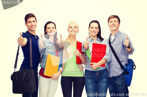 Image of group of smiling students showing thumbs up