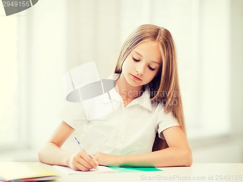 Image of student girl studying at school