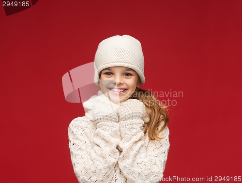 Image of girl in hat, muffler and gloves