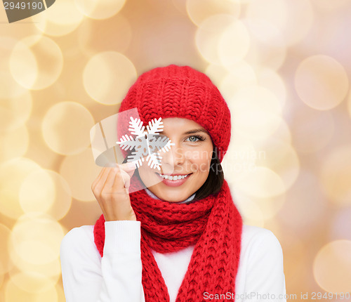 Image of smiling young woman in winter clothes