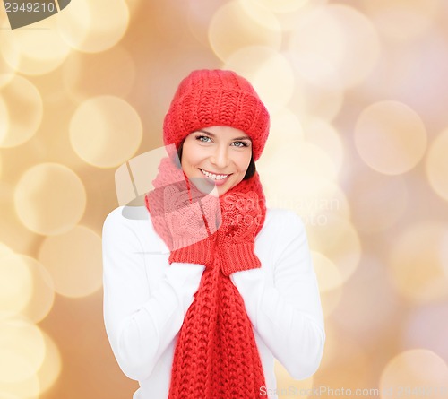 Image of smiling young woman in winter clothes