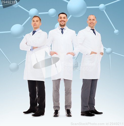 Image of group of smiling male doctors in white coats