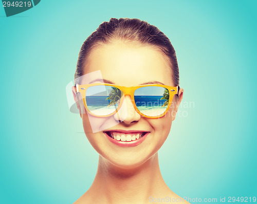 Image of happy teenage girl in sunglasses