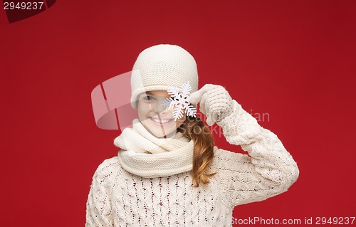 Image of girl with big snowflake