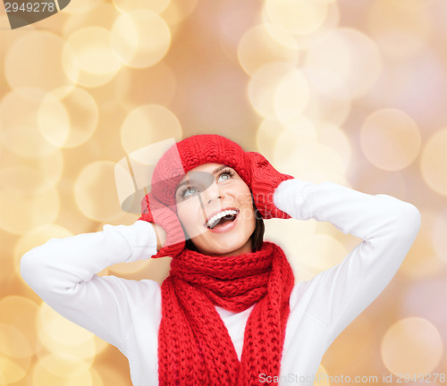 Image of smiling young woman in winter clothes